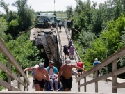 Киев заявляет о невозможности начать разминирование возле моста в Станице Луганской