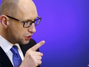 Яценюк требует от России отменить запрет на транзит украинских фур