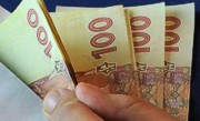 Нацбанк понизил официальный курс доллара к гривне